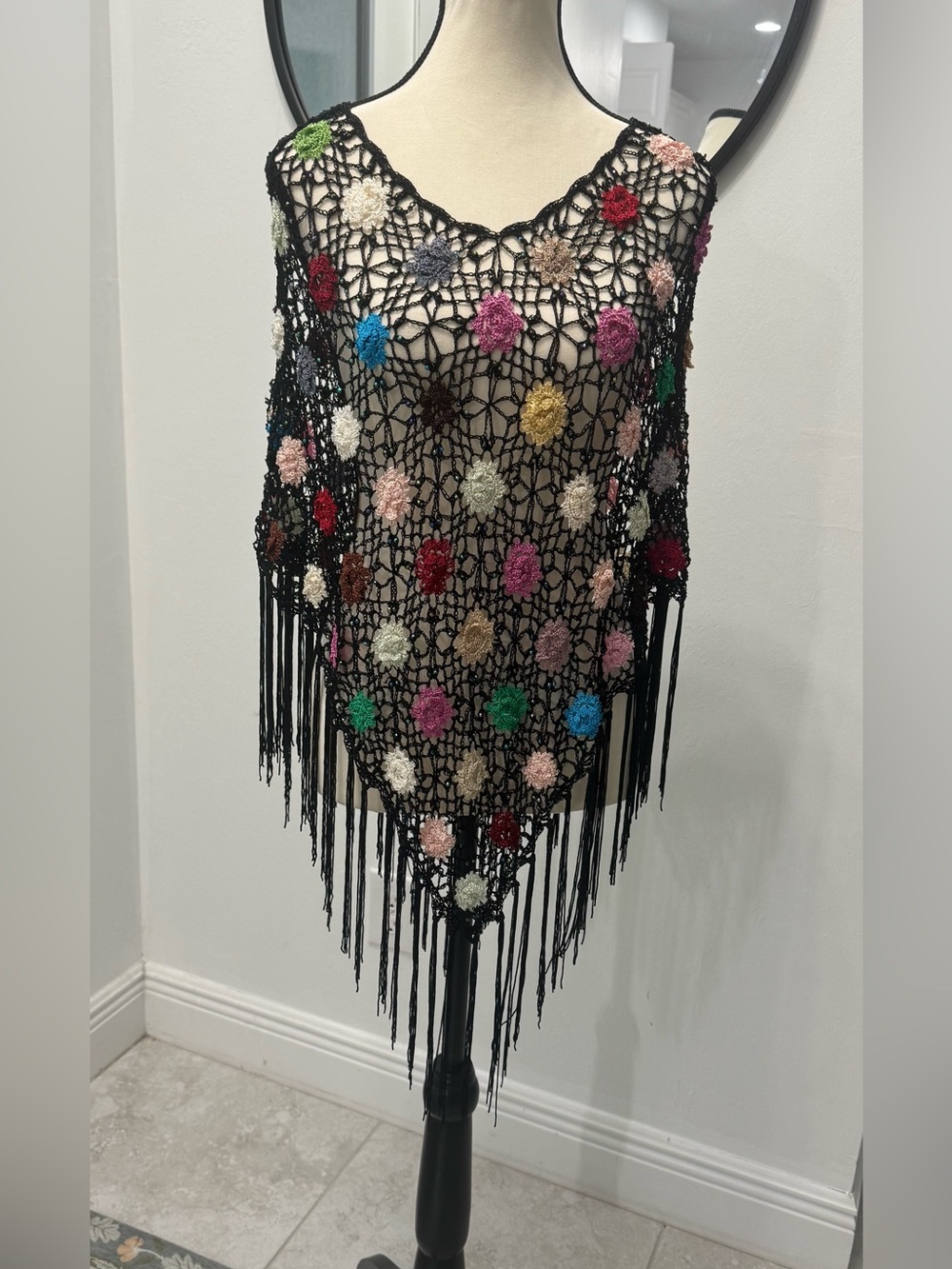 Y2K
Black Crochet Floral Fringe Poncho with Multicolor Flowers - Picture 2 of 7